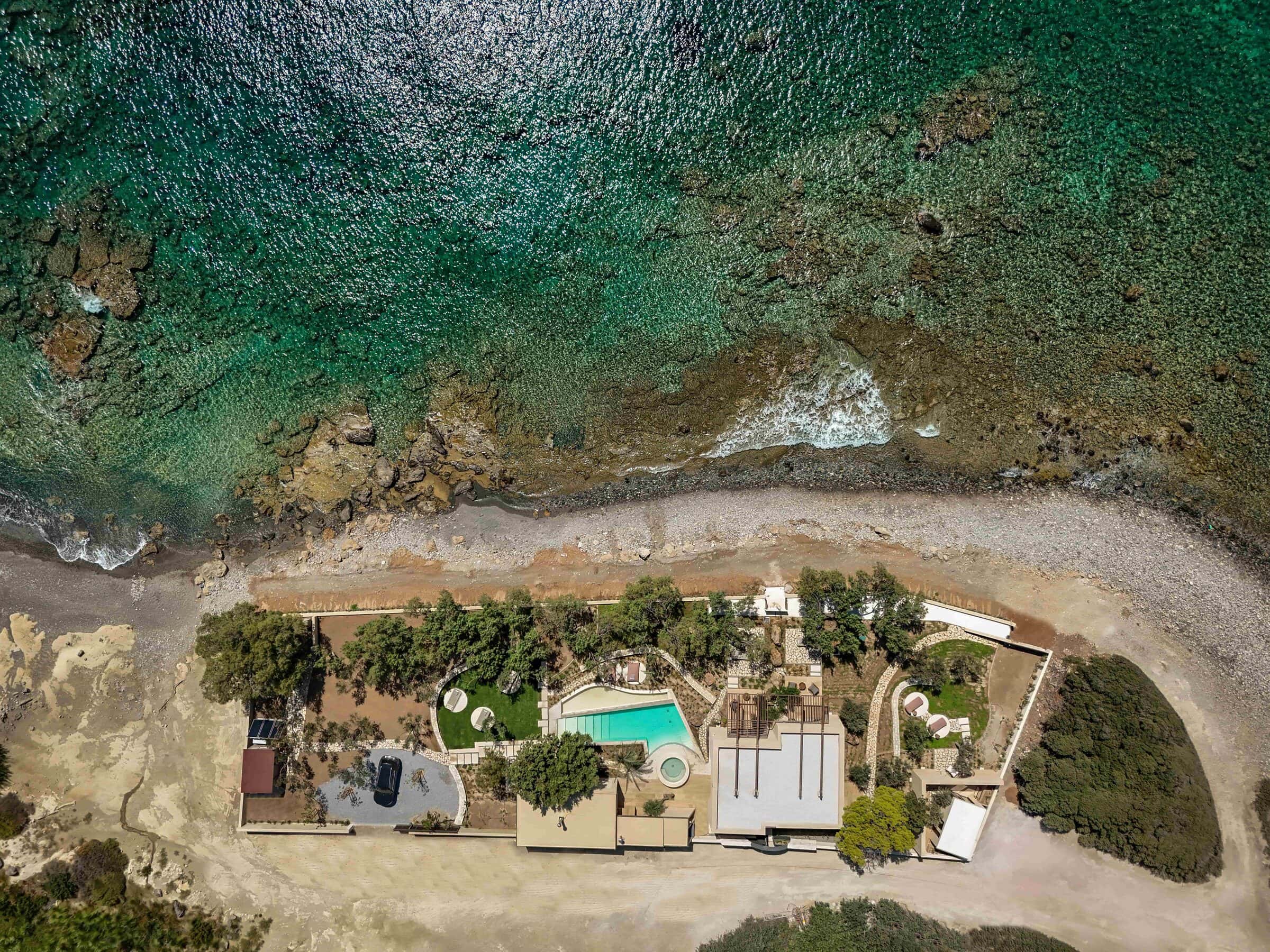 Aerial view of The Echo of the Sea villa on the Cretan coastline